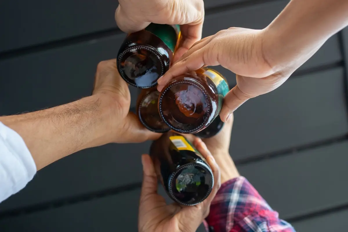A group standing together with drinks